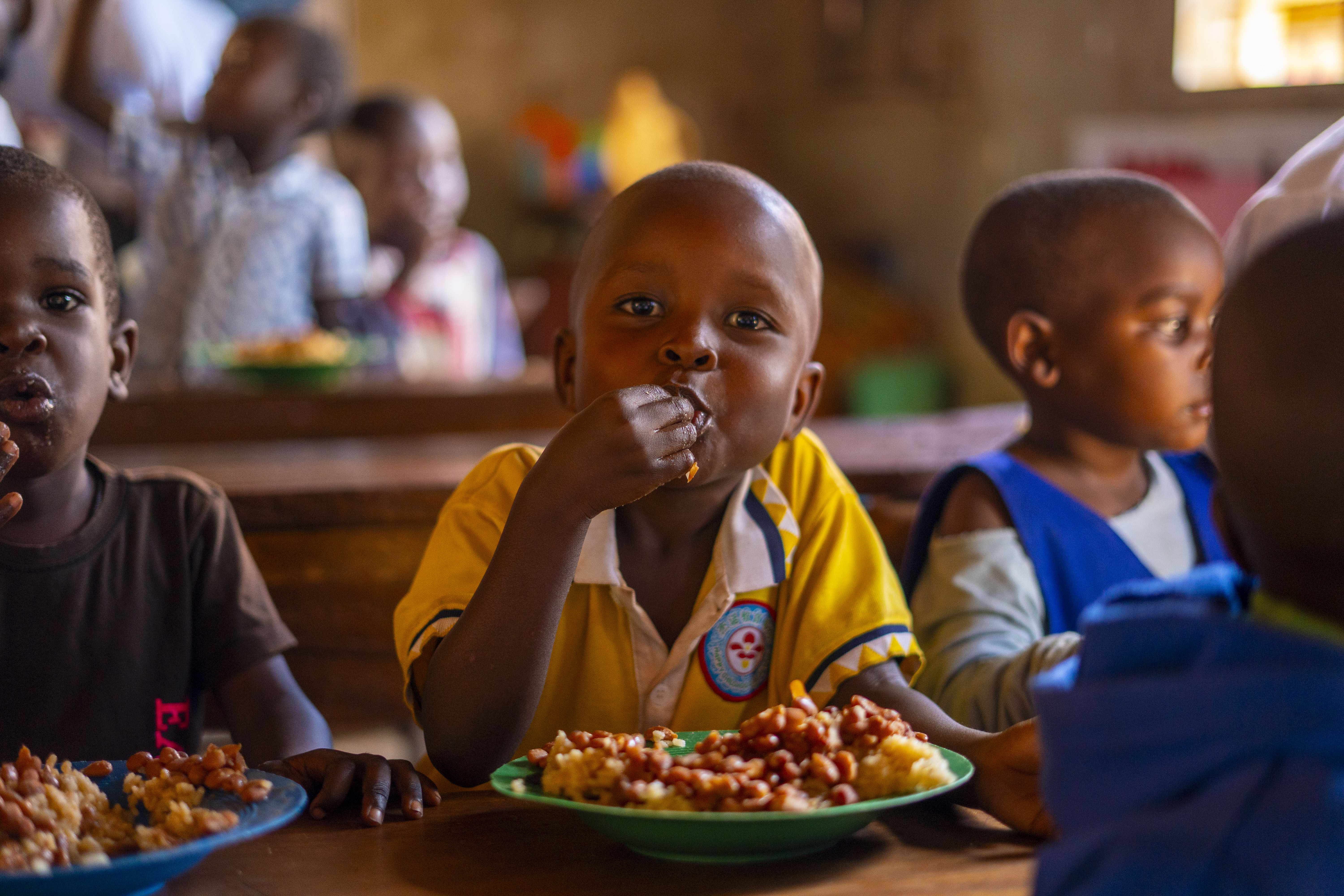 A Hofai child eating