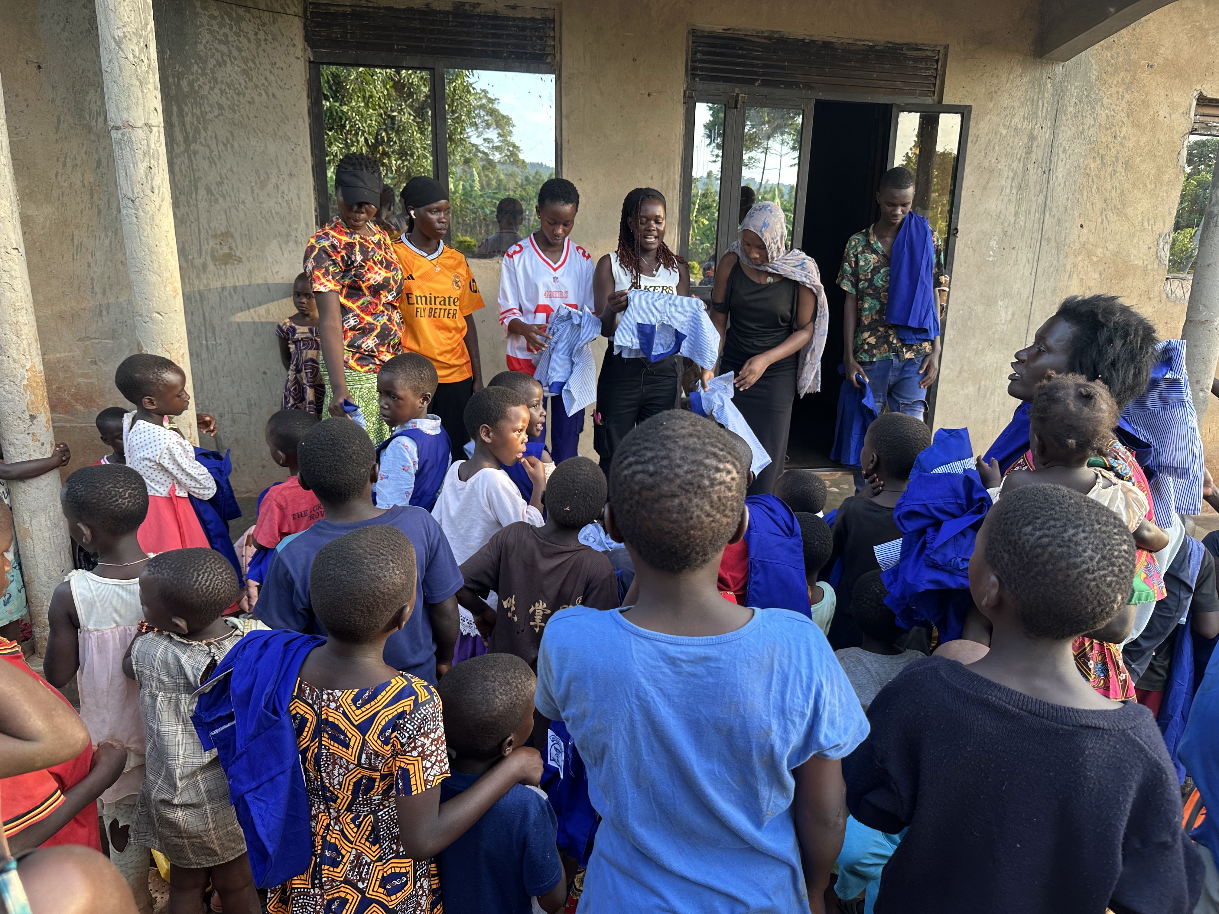 Women giving uniforms